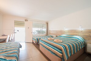 Standard Suite, 1 Bedroom, Non Smoking (Quad Room) | Desk, soundproofing, iron/ironing board, free cribs/infant beds