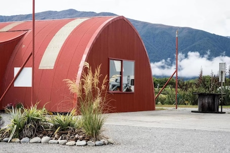 Helicopter/plane tours. Haast River Motels & Holiday Park