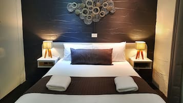 Standard Suite, 1 Bedroom, Non Smoking, Kitchenette (Queen Bed Single Guest) | 1 bedroom, iron/ironing board, free WiFi, bed sheets