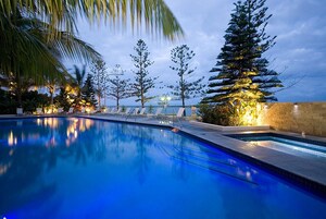 Outdoor pool, a heated pool, pool umbrellas, sun loungers