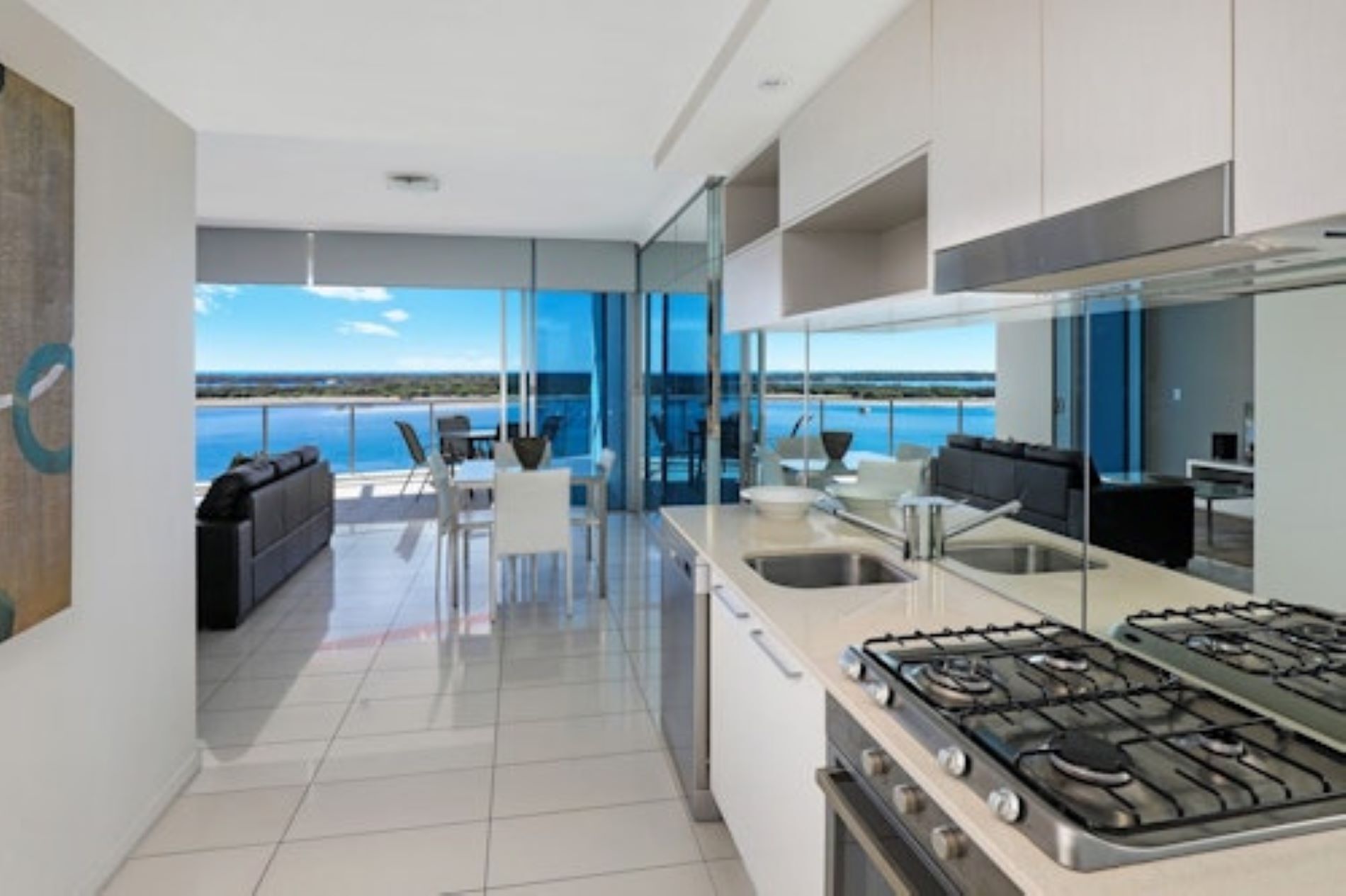 One Bedroom Superior Water View | Private kitchen | Fridge, microwave, oven, stovetop