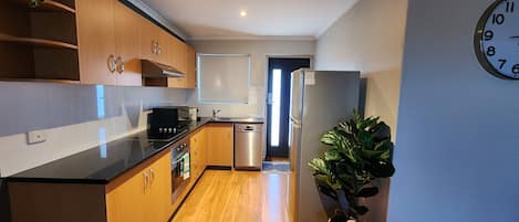 Standard Apartment, 2 Bedrooms | Private kitchen | Full-sized fridge, microwave, oven, stovetop