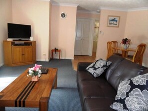 Standard Apartment, 2 Bedrooms, Non Smoking, Kitchen (Pool View Unit) | Living area | Flat-screen TV