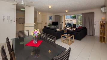 One Bedroom Apartment Lock Off | Living area | Flat-screen TV