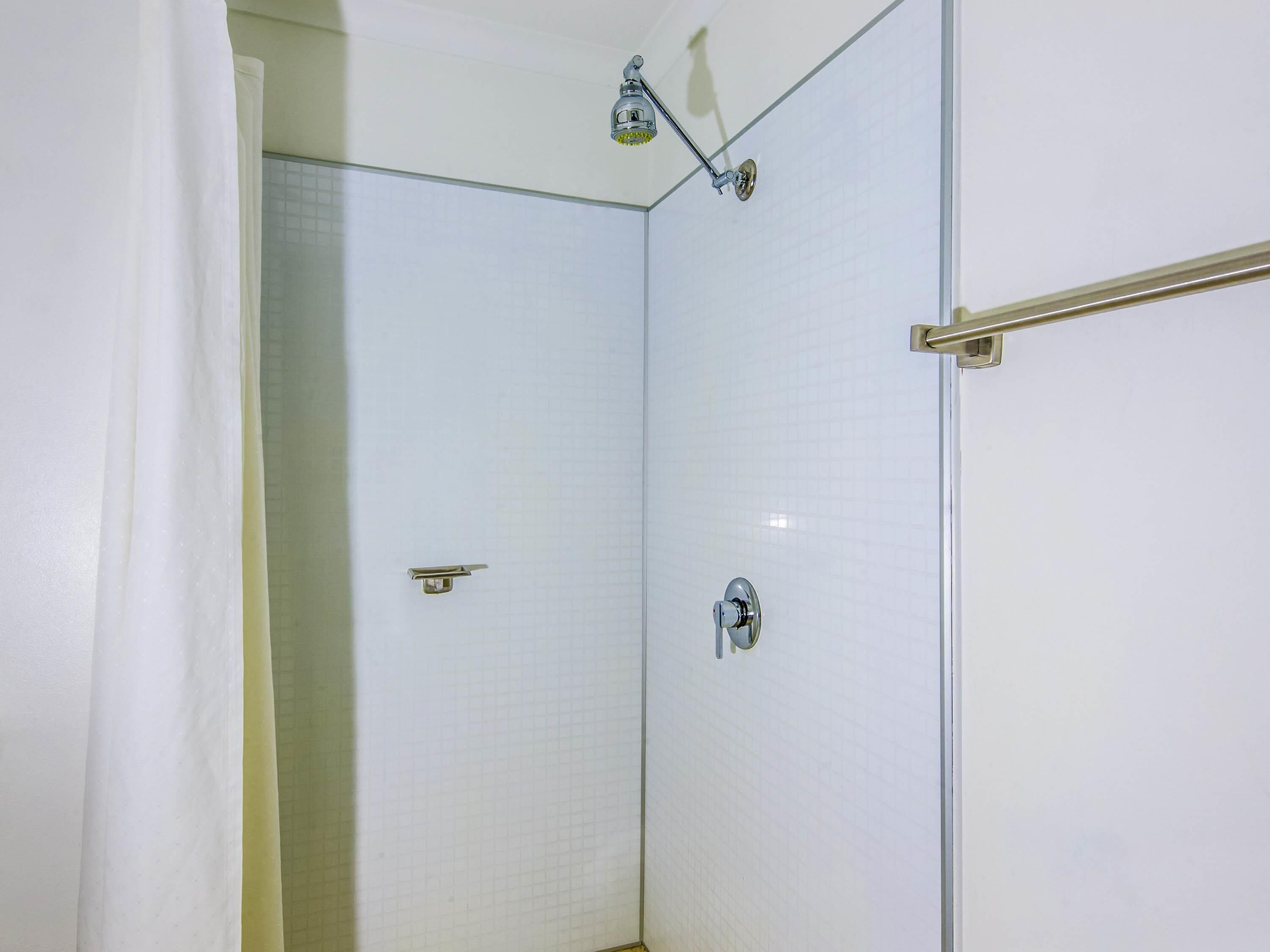 premium bedding, laptop workspace, blackout curtains, cots/infant beds