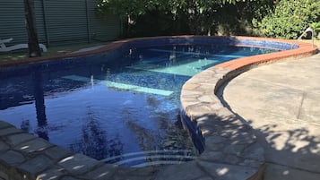 Outdoor pool, pool umbrellas, pool loungers