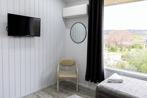Chambre Double Deluxe pour 1 personne, 1 chambre, vue colline | Coin séjour