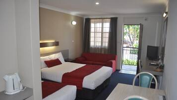 Premium bedding, down duvets, pillow-top beds, blackout curtains