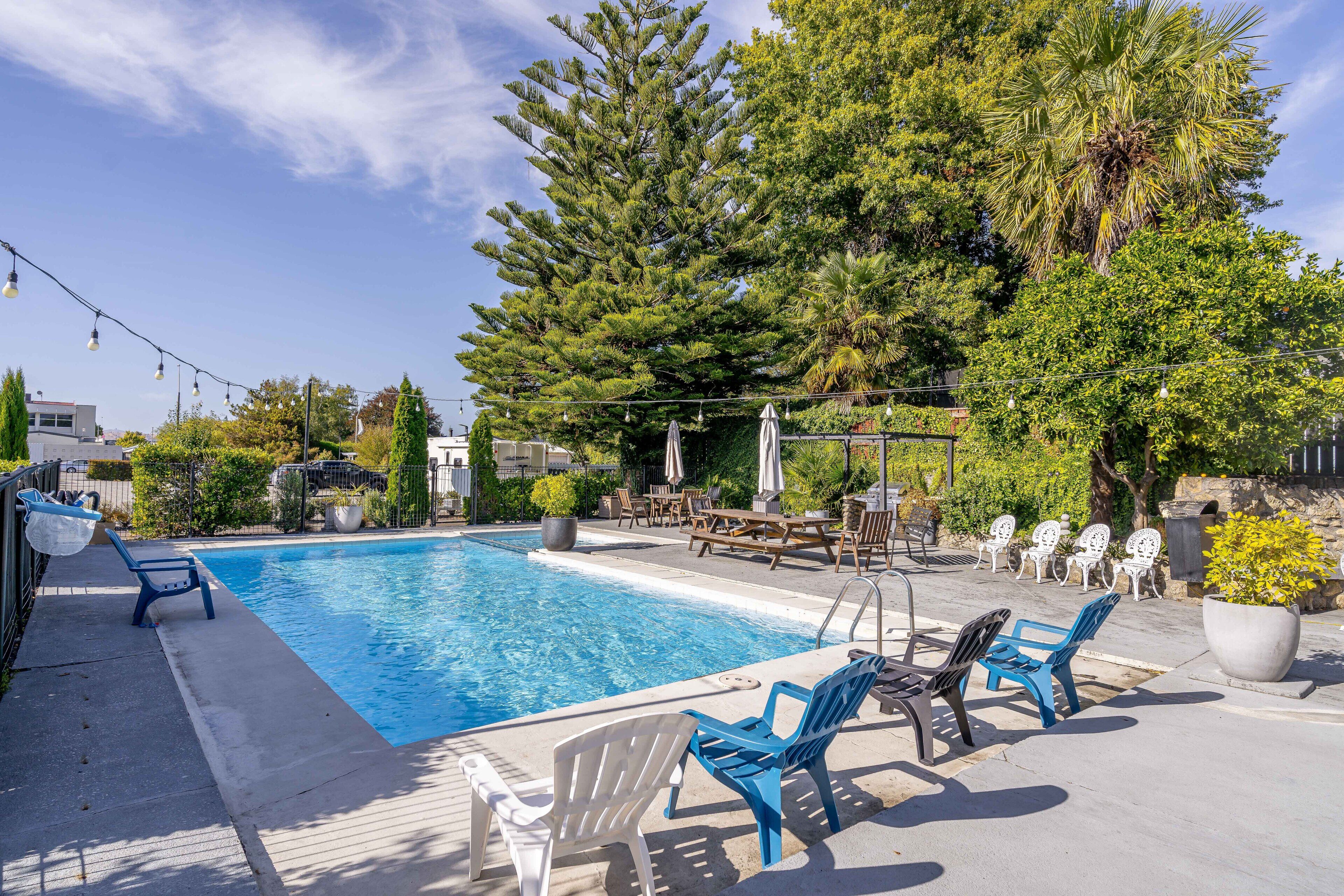 Seasonal outdoor pool, pool loungers