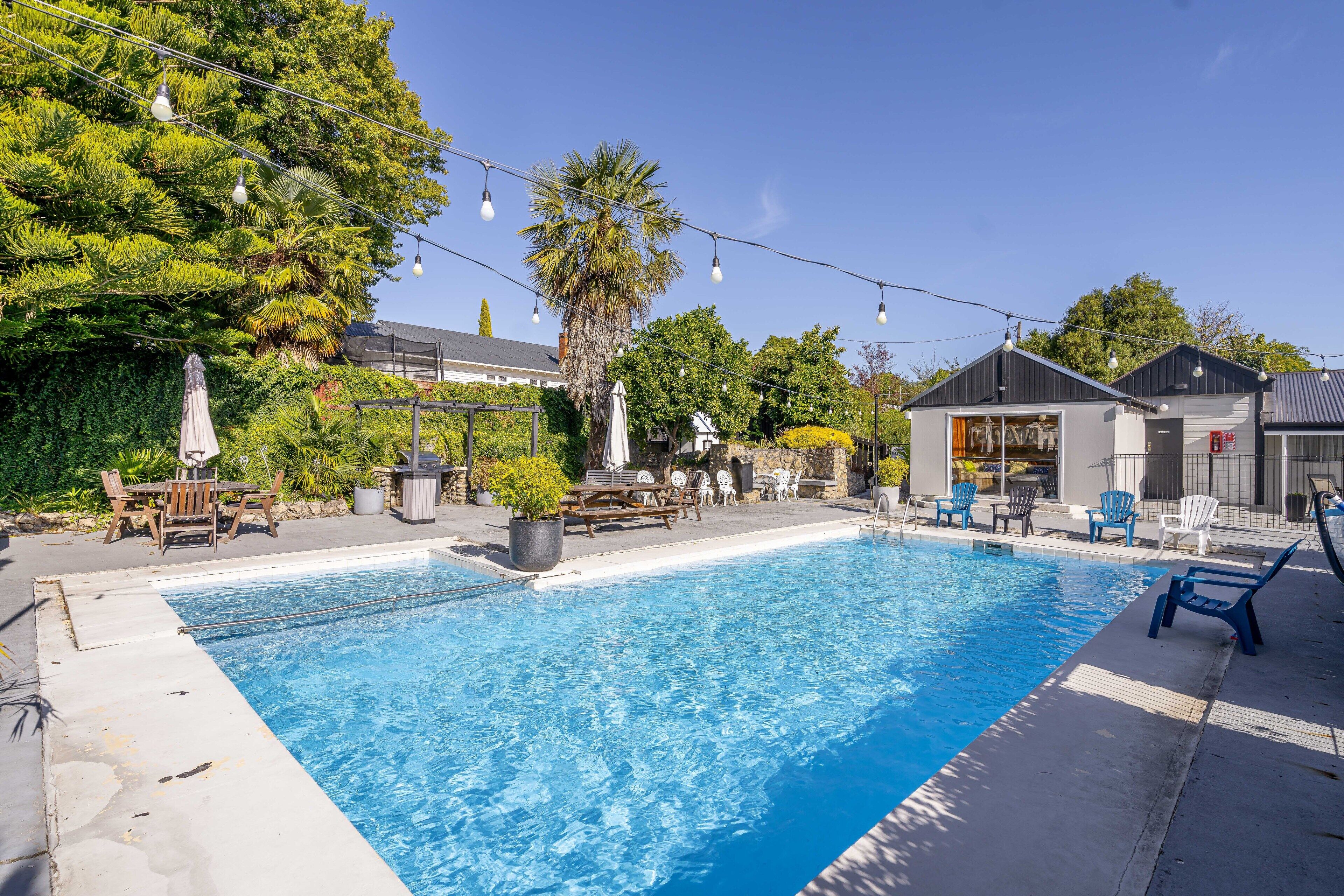 Seasonal outdoor pool, pool loungers