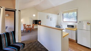 One Bedroom Apartment | Living area | 55-inch Smart TV with digital channels, TV - Executive Hideaway Motel (Benalla)