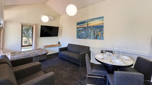 Two Bedroom Apartment | Living area | 55-inch Smart TV with digital channels, TV - Executive Hideaway Motel (Benalla)