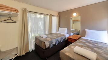 Two Bedroom Apartment | Iron/ironing board, WiFi (free), bed sheets