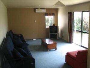 Standard Suite, 2 Bedrooms, Kitchenette (Unit) | Living area
