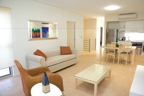 Three Bedroom Apartment  | Living area | 55-inch Smart TV with digital channels, TV, iPod dock - Broadwater Mariner Resort (Beresford)
