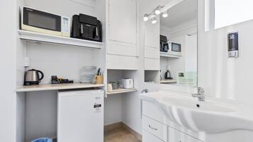 Fridge, microwave, electric kettle, toaster