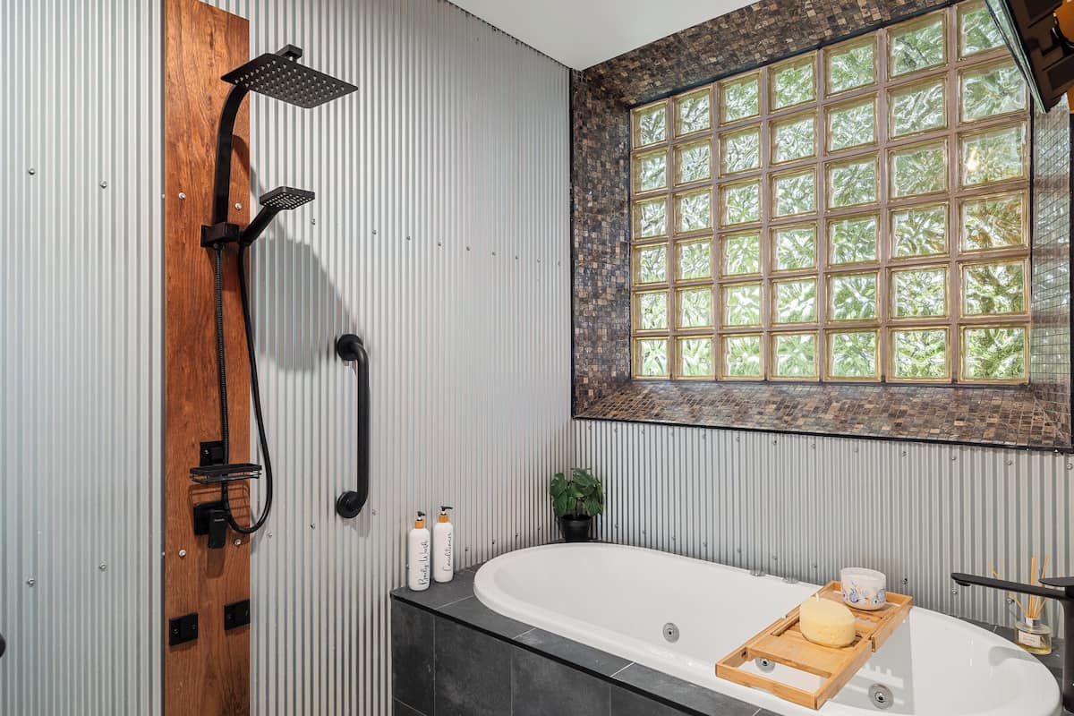 the castle spa suite | bathroom | hair dryer, dressing gowns, towels, soap