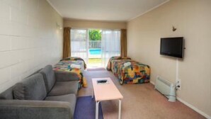 Standard Suite, 1 Bedroom, Non Smoking, Kitchen (Unit B) | Iron/ironing board, WiFi (surcharge) - Takanini Park Motor Lodge (Takanini)