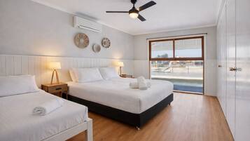 Three Bedroom House (Pet Friendly) - Waterfront | 1 bedroom, soundproofing, iron/ironing board, bed sheets