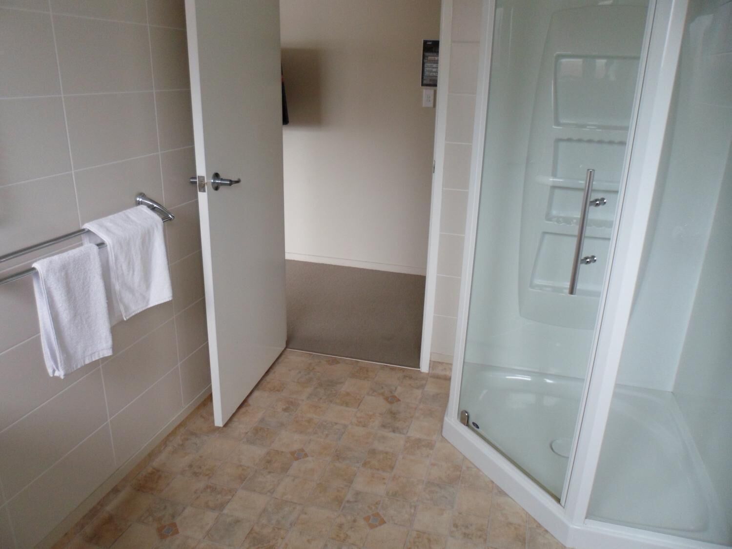 Shower, free toiletries, hair dryer, towels
