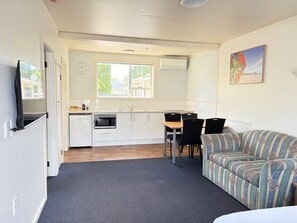 Quarto família | Área de estar | TV 32 polegadas com canais digitais