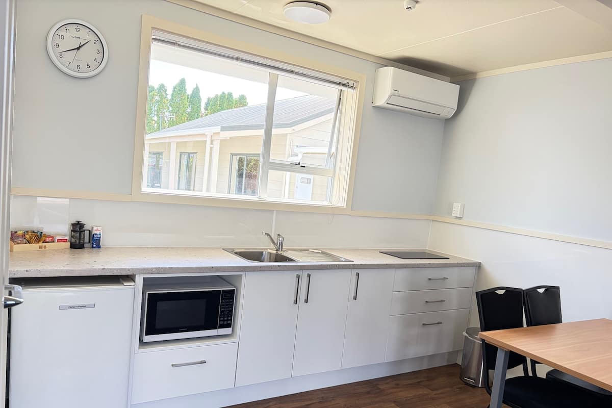 Family Room, 1 Bedroom (downstairs) | 1 bedroom, iron/ironing board, free WiFi, bed sheets