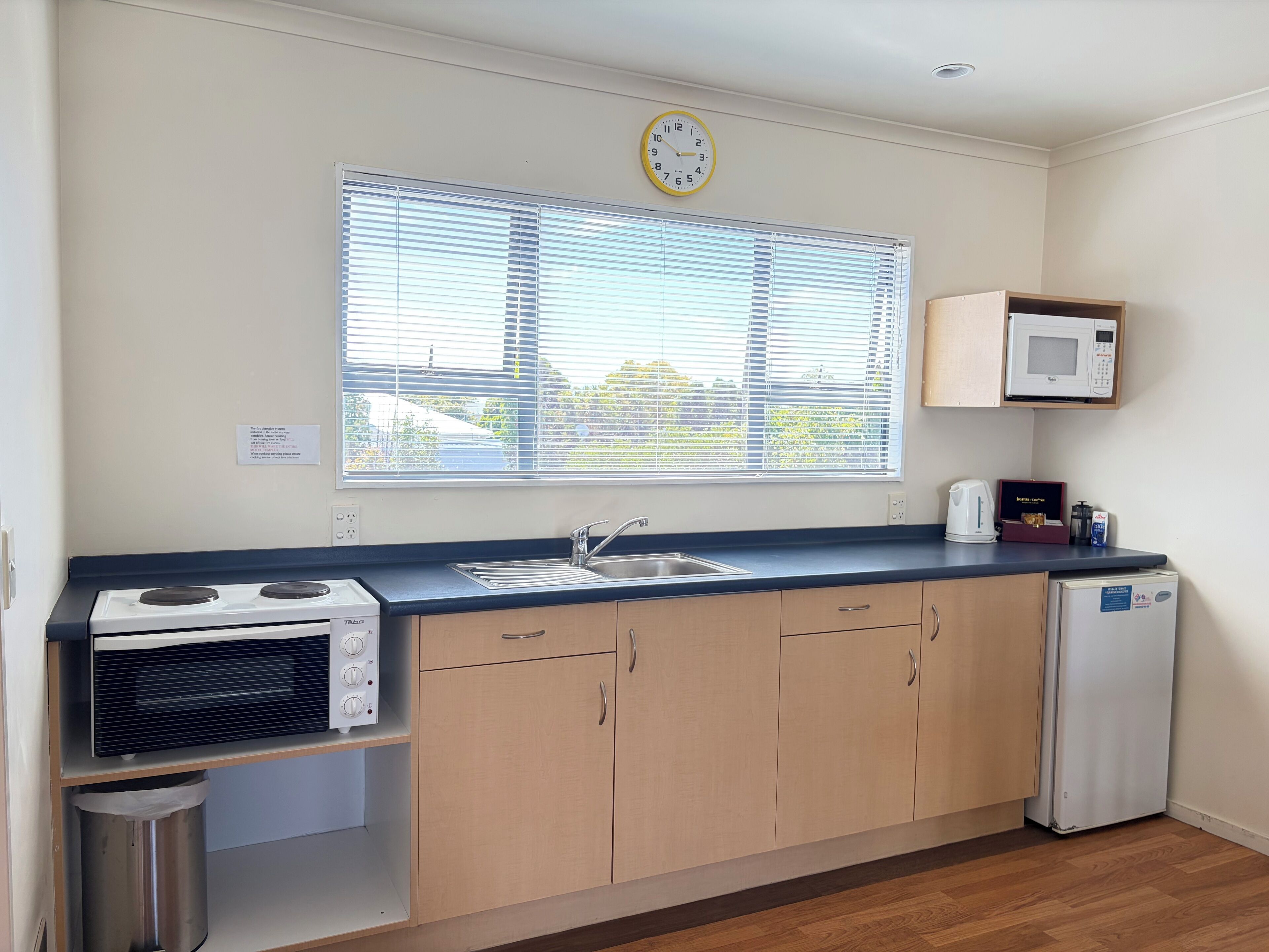 Family Room | Private kitchen | Mini-fridge, microwave, electric kettle