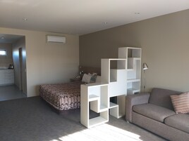 Desk, blackout drapes, iron/ironing board, free cribs/infant beds