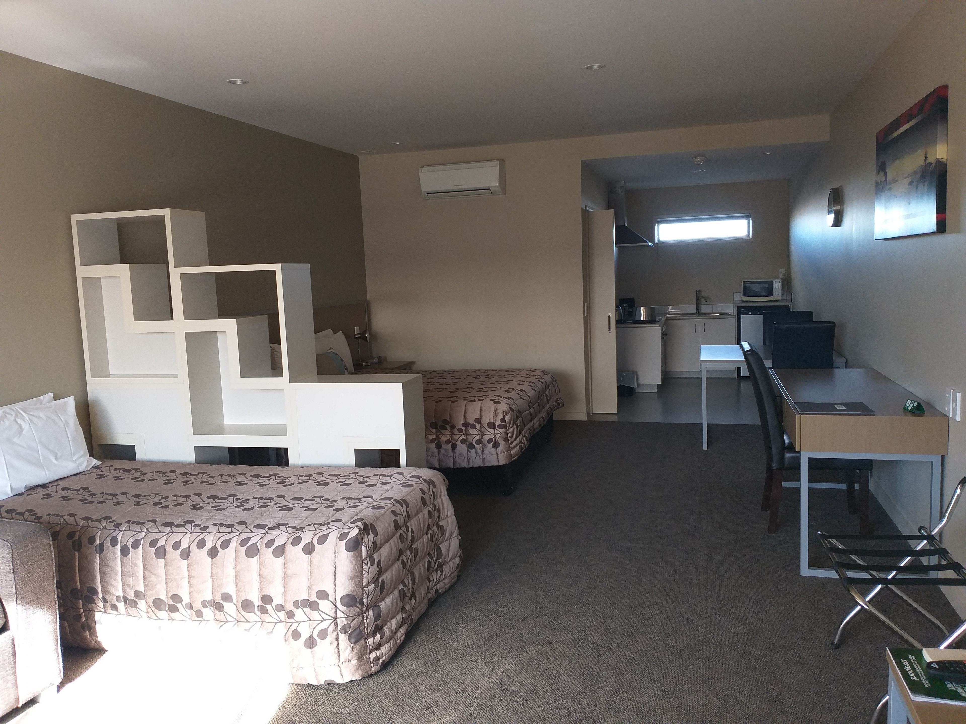 Desk, blackout curtains, iron/ironing board, free cots/infant beds