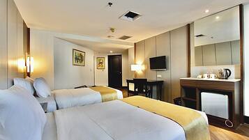 Deluxe Twin Room | Minibar, in-room safe, desk, iron/ironing board (on request)