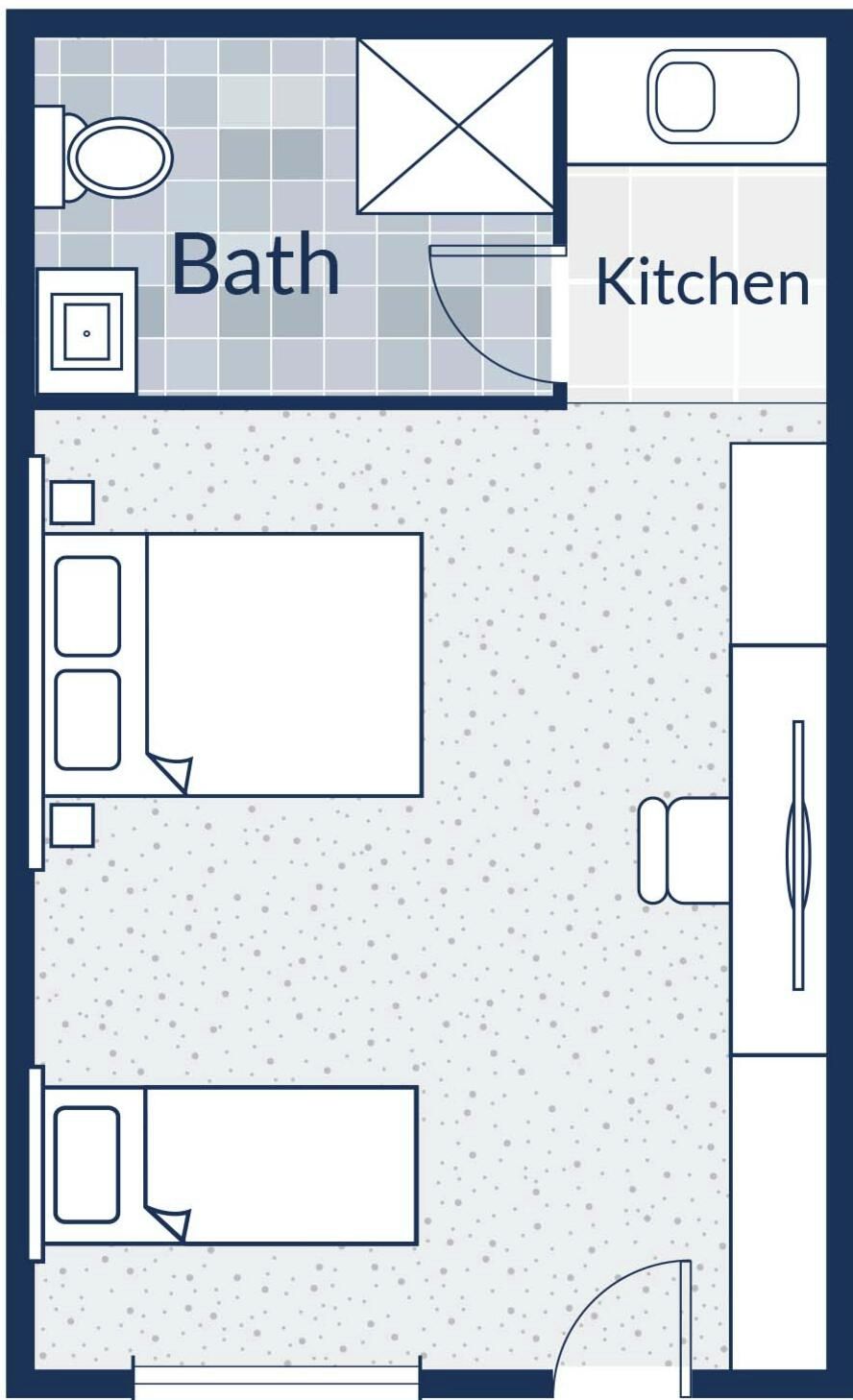 Un plan d’étage d’une chambre d’hôtel comprenant une salle de bain et un coin cuisine.