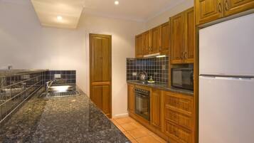 Standard Lake-view, 1 Bedroom Apartment  | Desk, iron/ironing board, cots/infant beds, wheelchair access