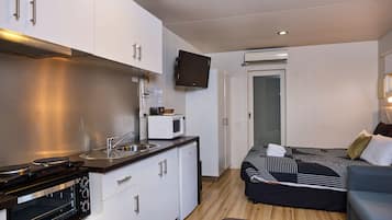 Basic-Bungalow, 1 Schlafzimmer | 1 Schlafzimmer, Bügeleisen/Bügelbrett, kostenloses WLAN, Bettwäsche