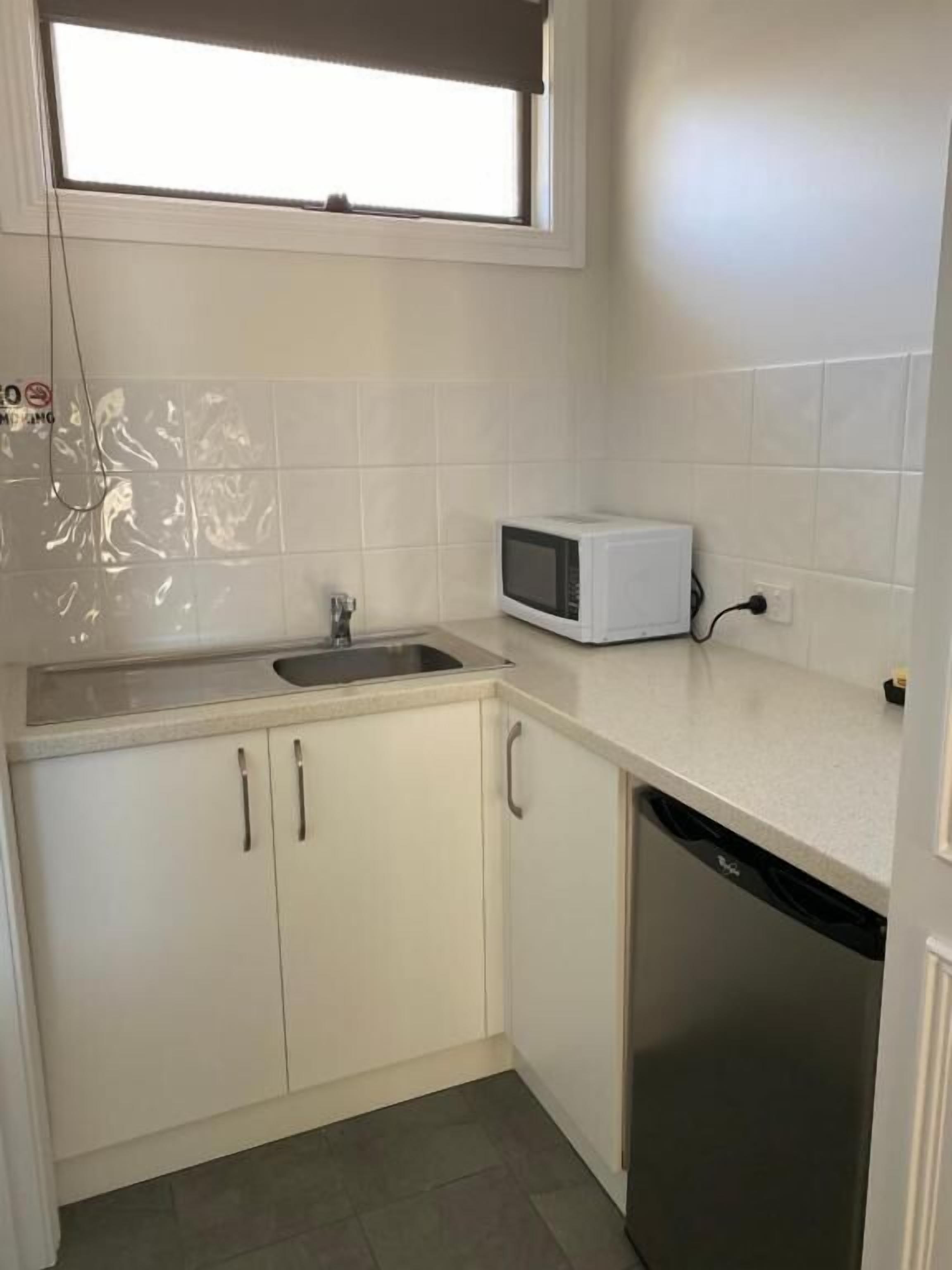 standard queen studio | private kitchen | mini-fridge, microwave, toaster