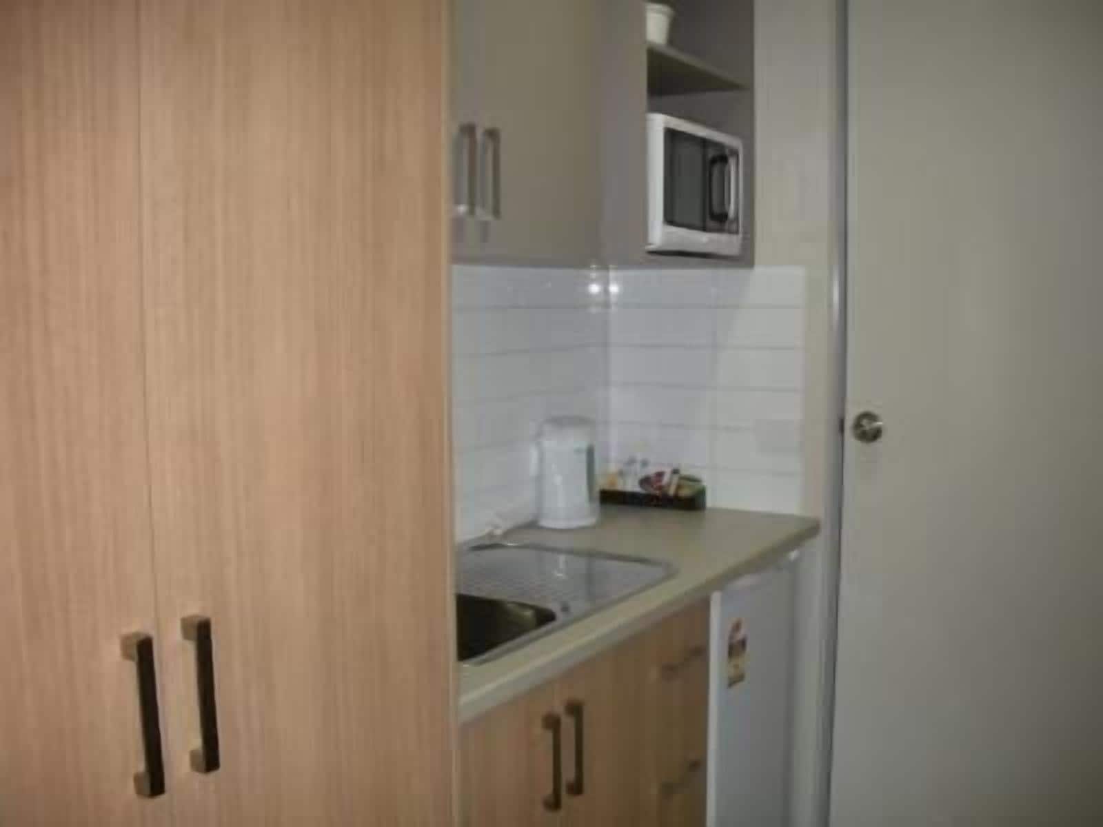 mini-fridge, microwave, toaster