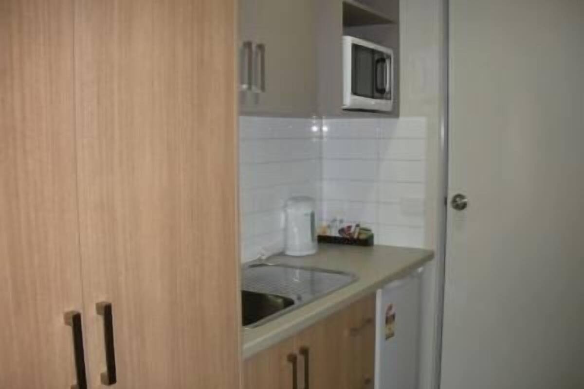mini-fridge, microwave, toaster