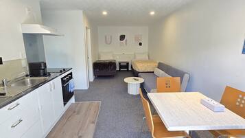 Family Apartment, 1 Bedroom, Air conditioning | Living area