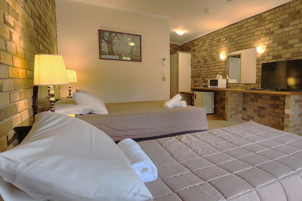 Disability Access Suite (Sleeps 2-3) | 1 bedroom, individually decorated, individually furnished, desk