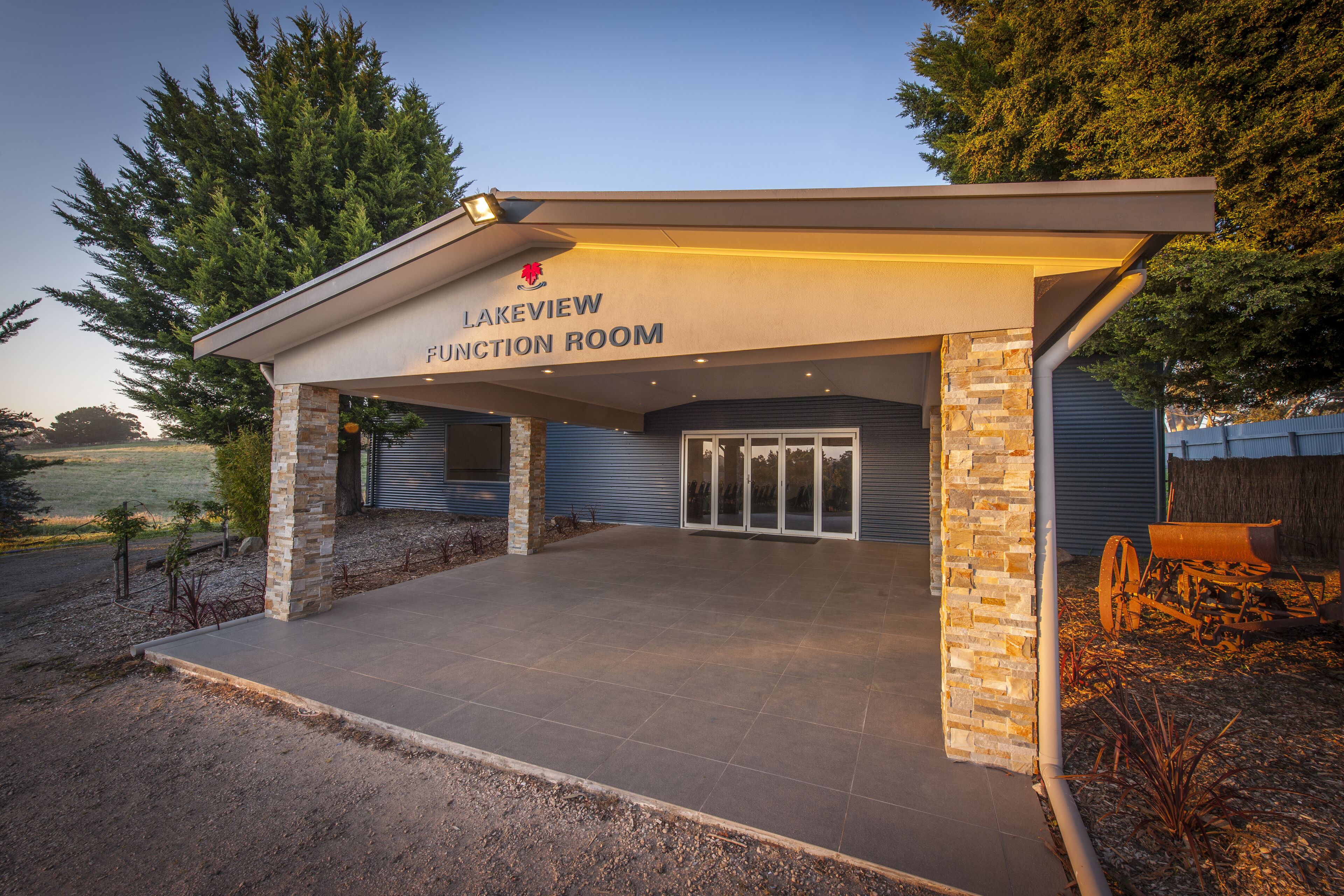 A building labeled "Lakeview Junction Room" with a covered entrance and stone pillars.