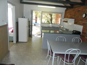 Fridge, stovetop, coffee/tea maker, cookware/dishes/utensils