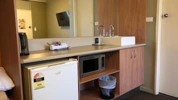 Family Room | Private kitchenette | Fridge, coffee/tea maker