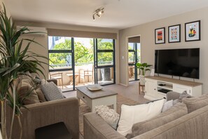 Resort 2 Bedroom Apartment | Living area | 42-inch TV with digital channels