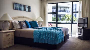Premium bedding, desk, laptop workspace, soundproofing