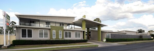 A modern two-story building with a flat roof, large windows, and a covered entrance area. - Drover's Motor Inn, Dalby (Dalby)