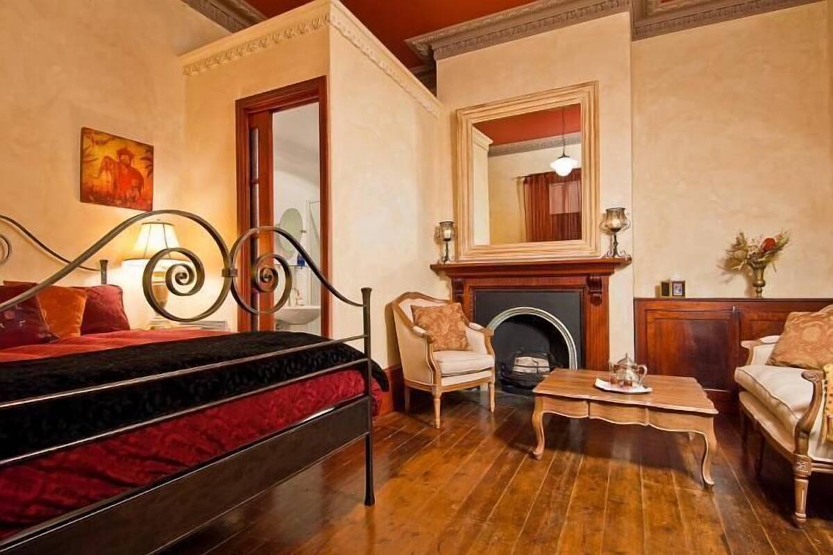 Quarto luxo, 1 quarto | Área de estar