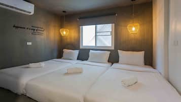 Triple Room, Non Smoking | In-room safe, blackout drapes, free WiFi, bed sheets