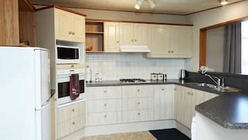 4 Bedroom Holiday Apartment | Private kitchen | Microwave, stovetop, coffee/tea maker, electric kettle