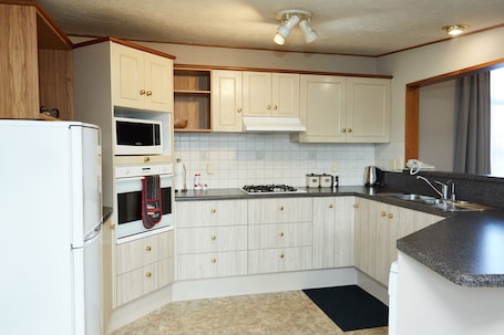 4 Bedroom Holiday Apartment | Private kitchen | Microwave, stovetop, coffee/tea maker, electric kettle