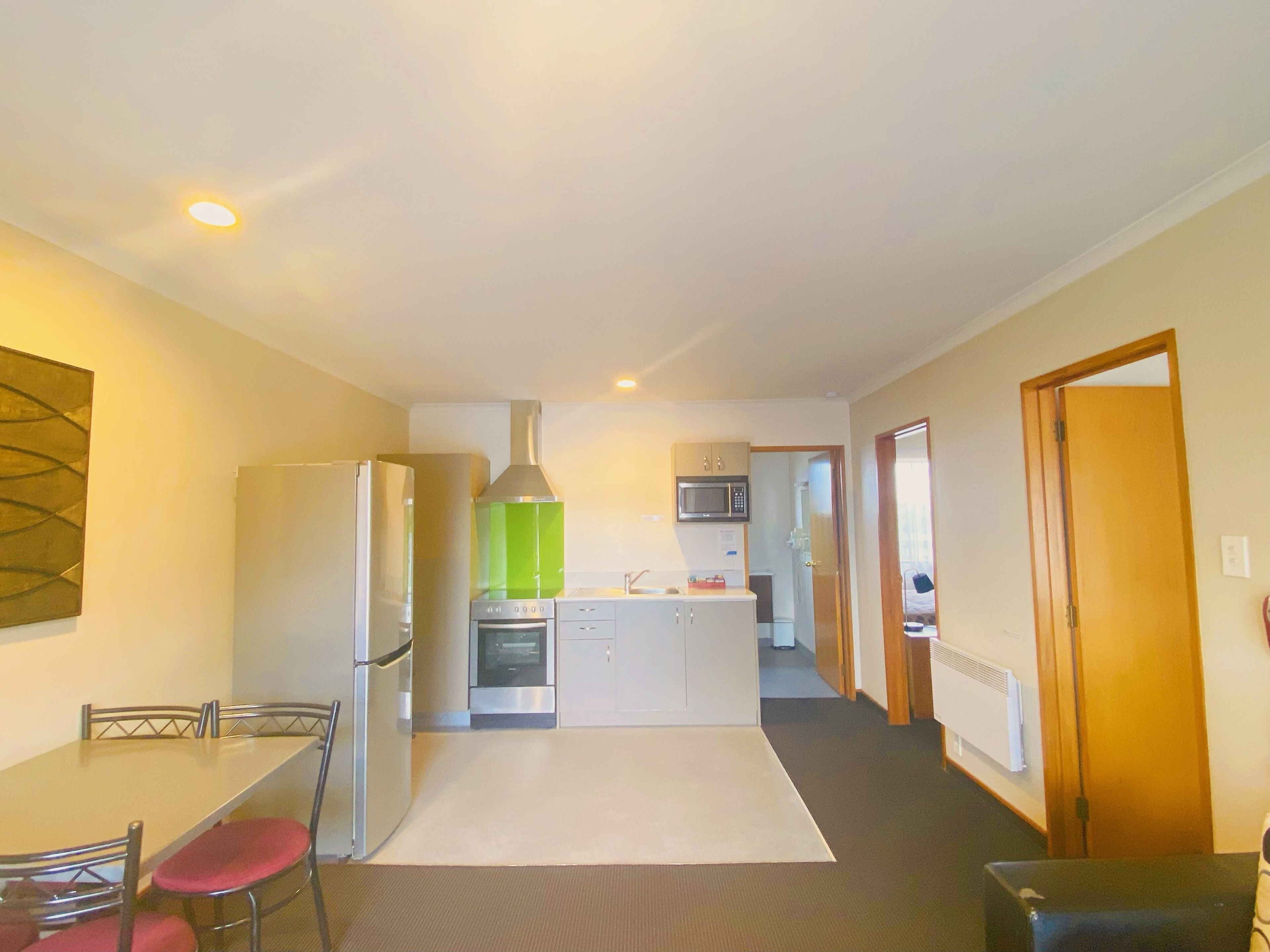 Deluxe Suite, 2 Bedrooms, Non Smoking, Kitchen | Iron/ironing board, free WiFi, bed sheets