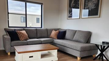 Superior Accessible 3 Bedroom Cabin | Living room | Flat-screen TV